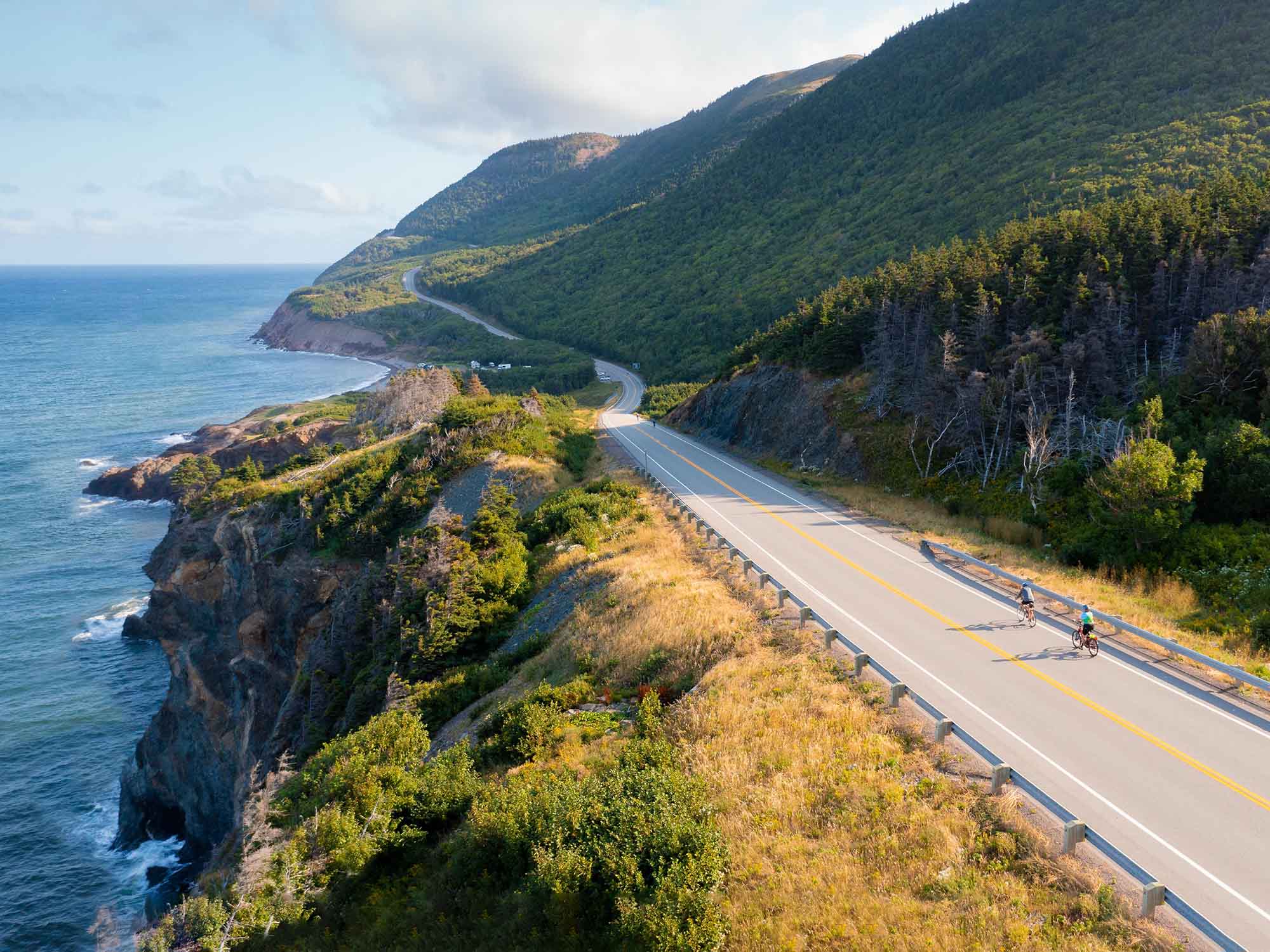 Cyclists traveling clockwise on the Cabot Trail in Cape Breton, Nova Scotia