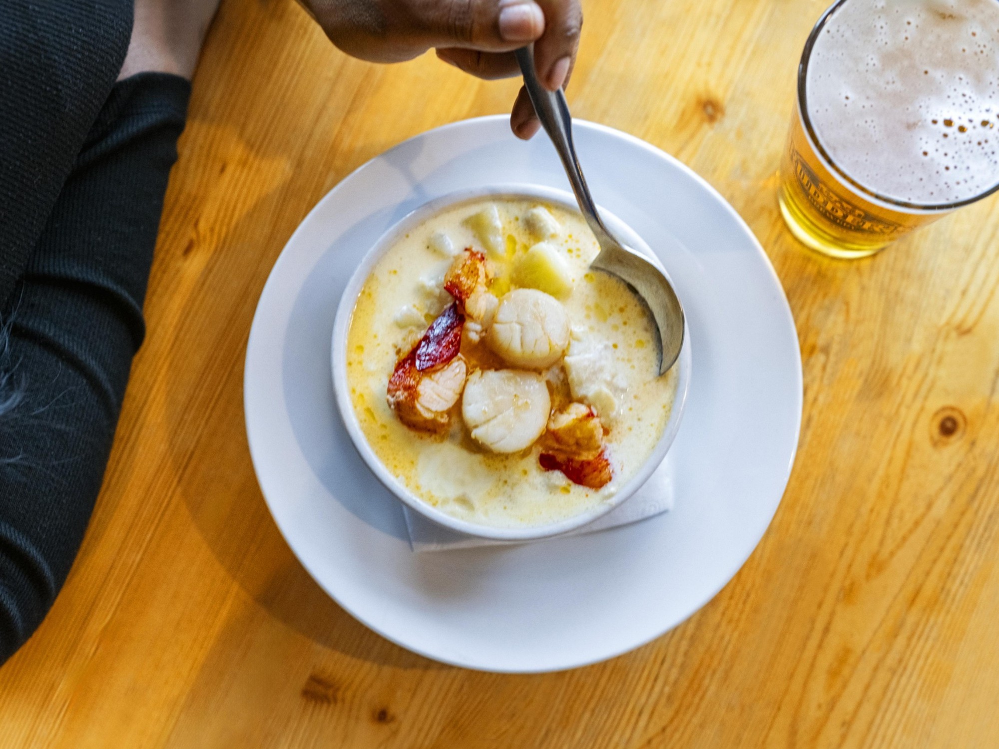 An overhead view of a bowl of chowder with scallops from Rudder's Seafood in Lunenburg.