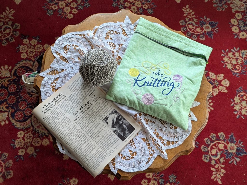 An over head view of a knitting book and tarn from the Memory Lane Fibre Arts Festival in Nova Scotia