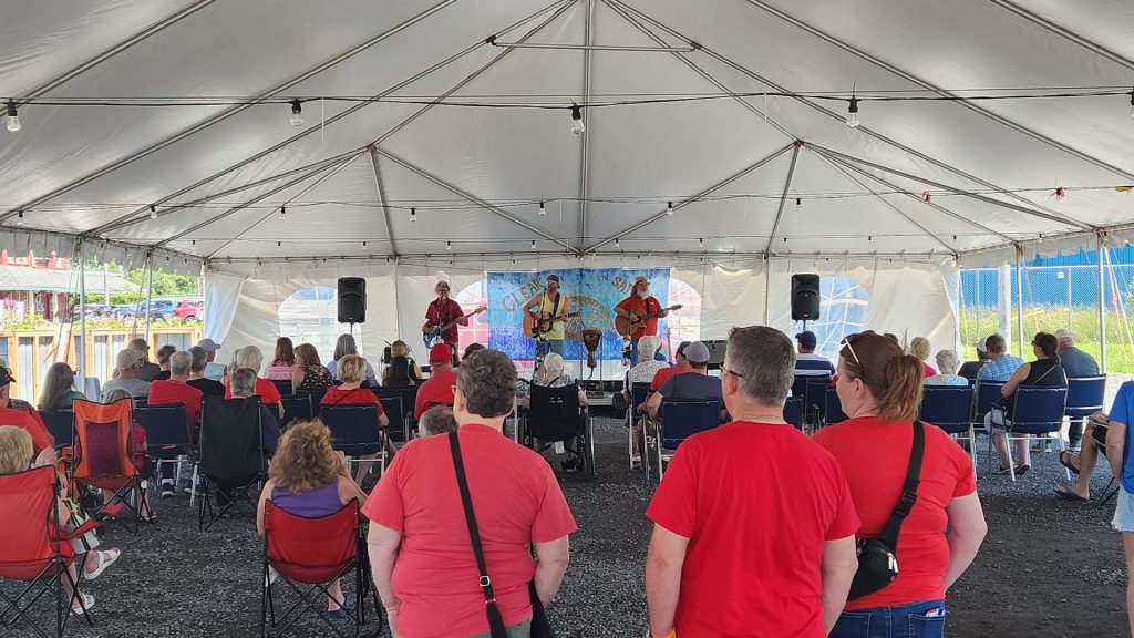 People enjoy a concert as part of the Canada Day Celebrations at Pictou Waterfront in Nova Scotia