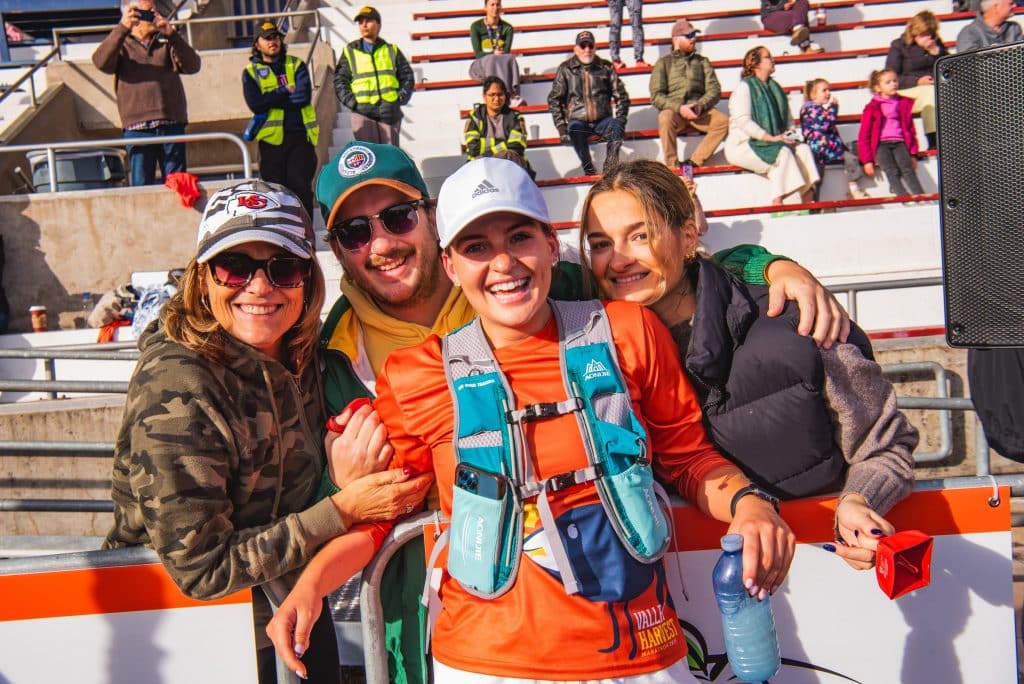 A runner at the Valley Harvest Marathon in Wolfville, Nova Scotia celebrate with their family
