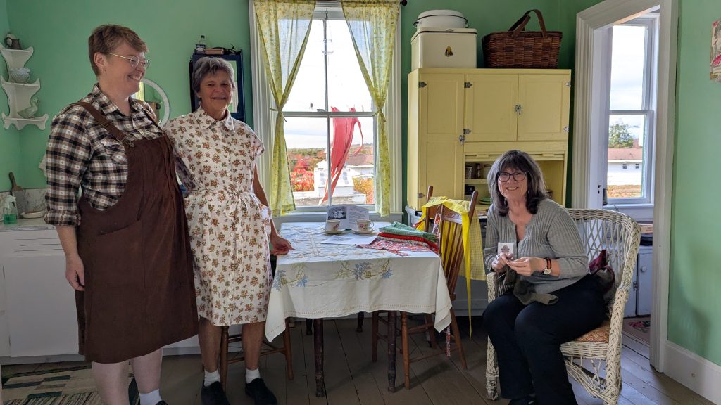 Three women enjoying the Memory Lane Fibre Arts Festival in Nova Scotia