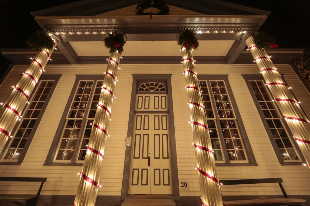 A close of view of one of the buildings at Sherbrooke Village lit up for Christmas