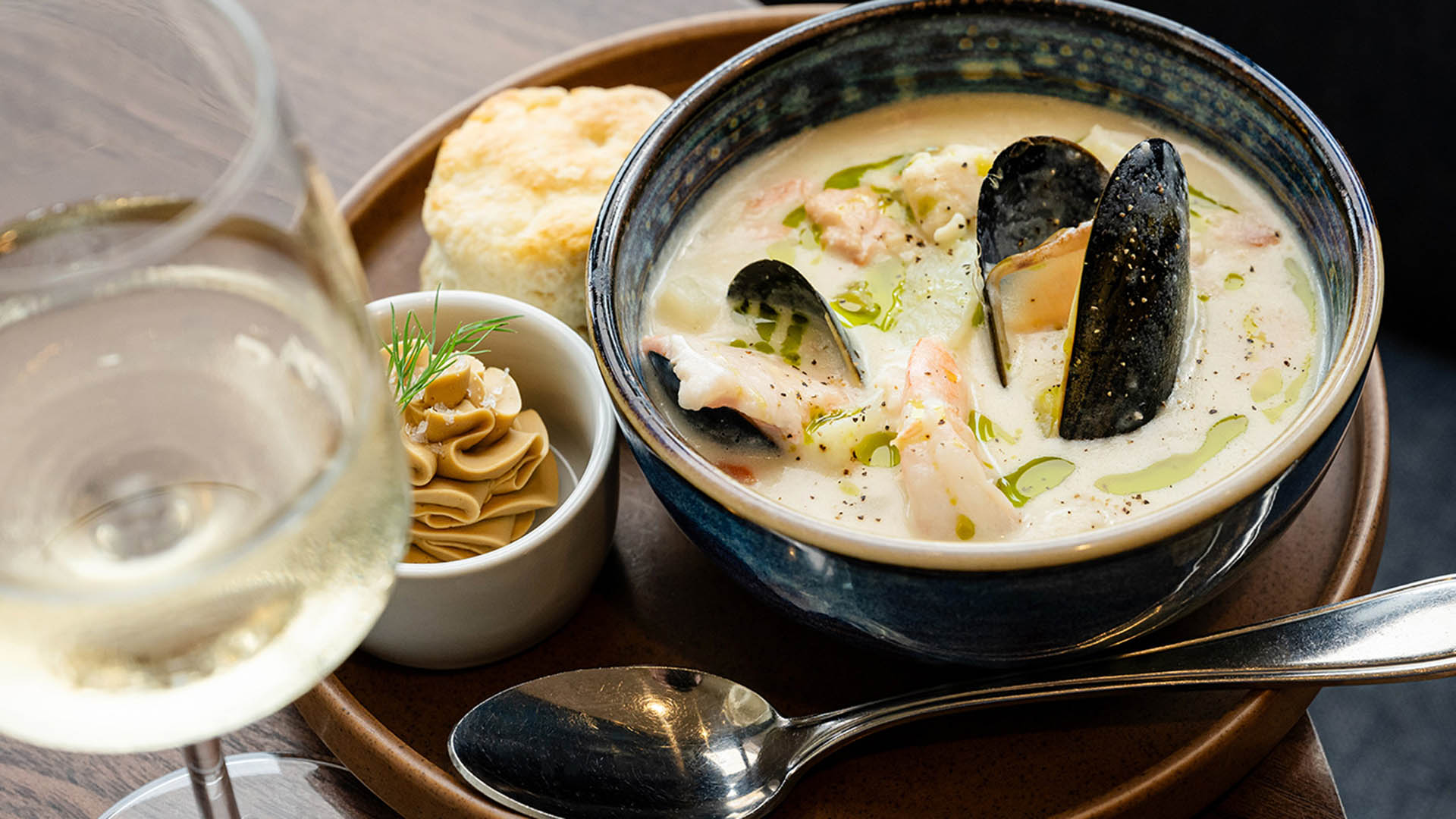 Seafood chowder and biscuit served during the Halifax Waterfront Seafood Tour with Curated Food Tours in Halifax, NS