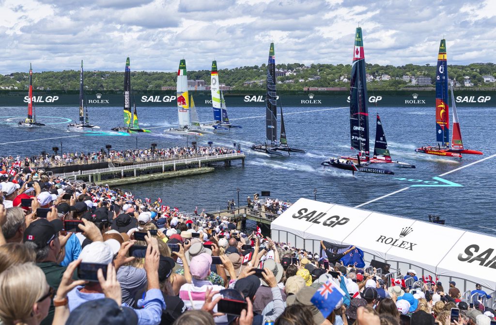 A bandstand full of spectators take in the Sail Grand Prix on the Halifax Harbour in Nova Scotia