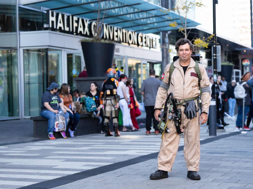 Person dressed as a character from Ghostbusters outside of the Halifax Convention Centre during Hal-Con in Nova Scotia.