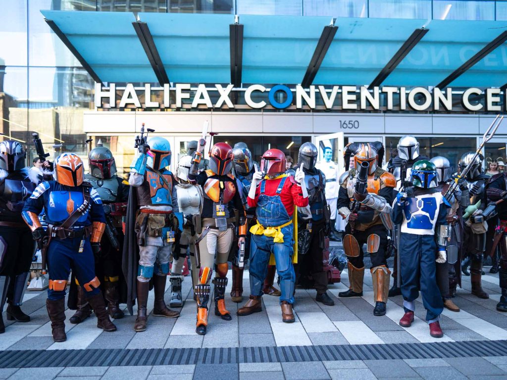 Costumed attendees pose for photos outside of the Halifax Convention Centre in downtown Halifax Nova Scotia during Hal-Con.