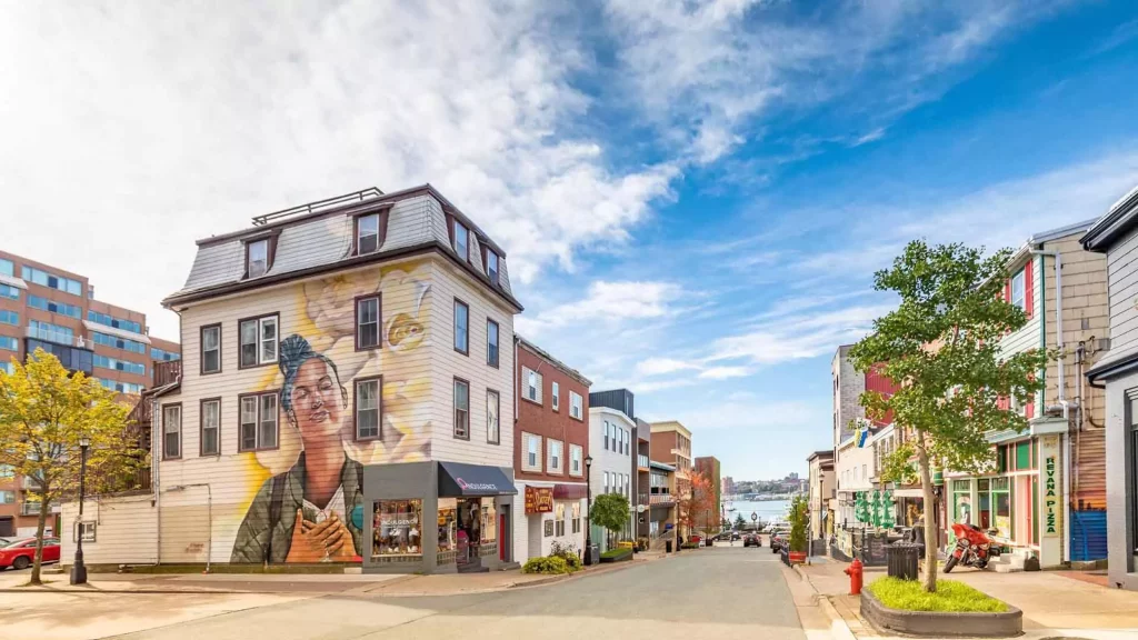 Mural of a woman on the side of a building on Portland Street in Downtown Dartmouth, Halifax Nova Scotia