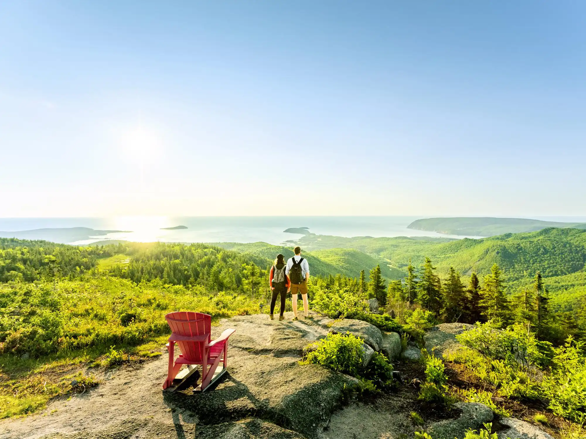 Two hikers take in the view on Franey Trail in Cape Breton
