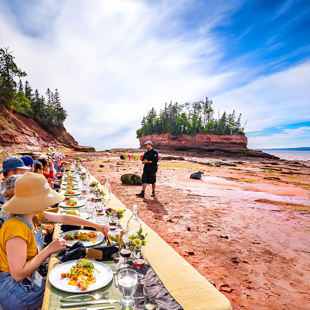 Dining on the Ocean Floor experience at Burntcoat Head Park in Nova Scotia at low tide on the Bay of Fundy.