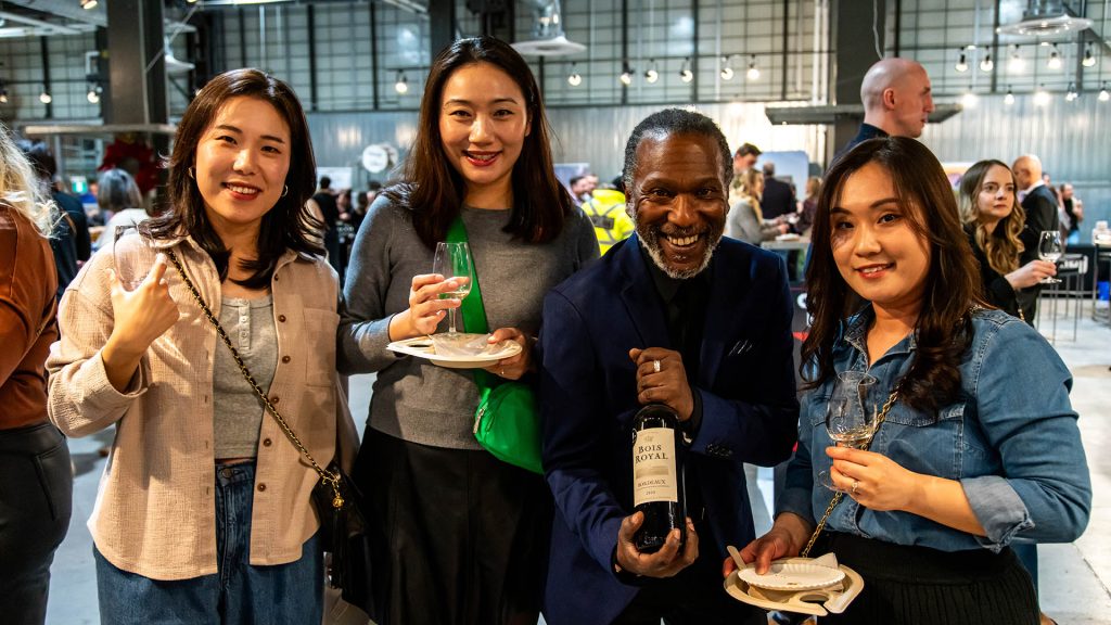 A group of four people enjoying the Halifax International Wine Festival