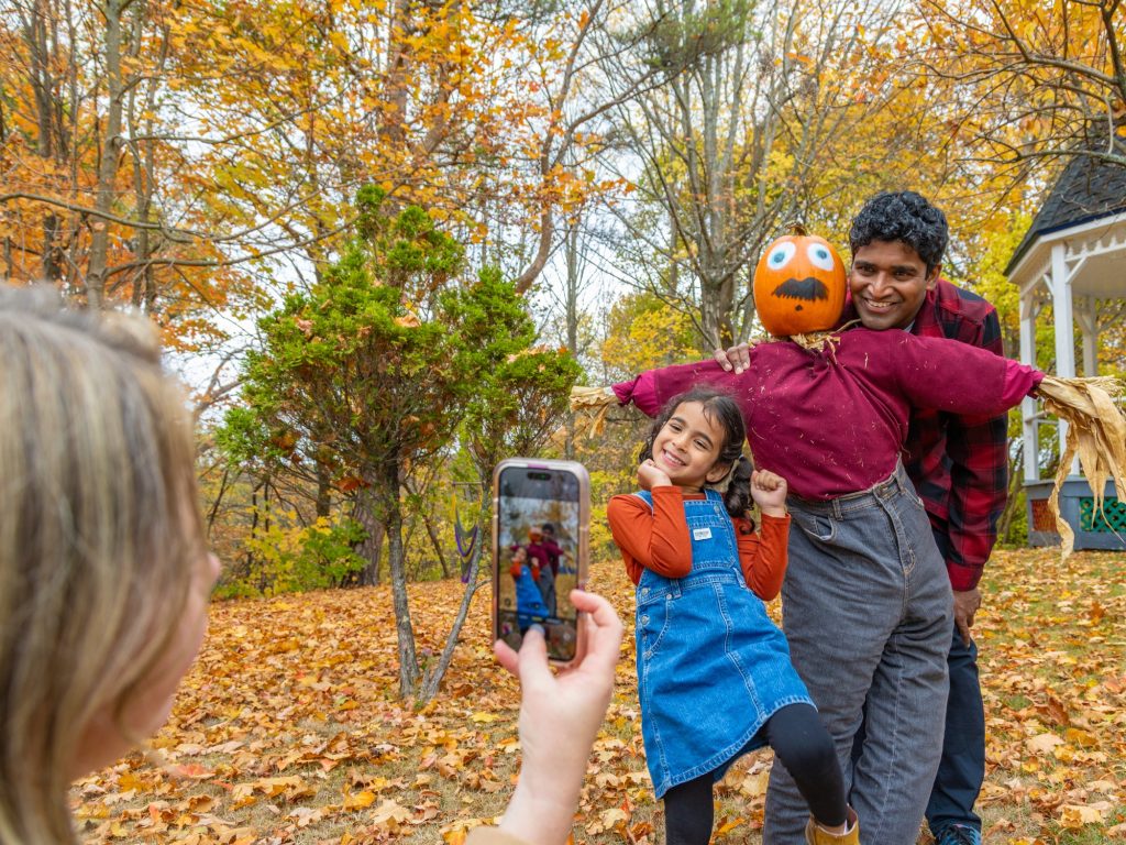 A family at the Kentville Pumpkin People Festival in Kentville, Nova Scotia