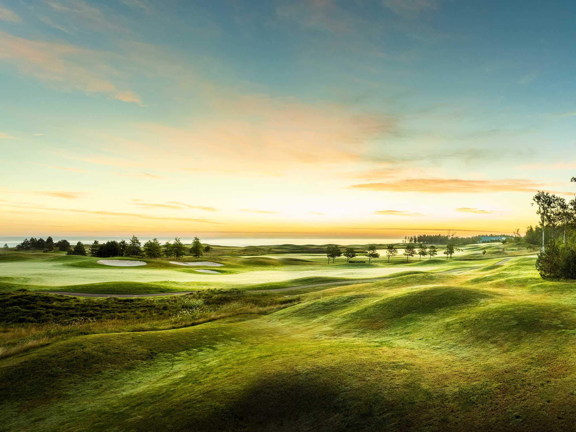 Sunset over the Northumberland Strait and the golf course at Fox Harb'r Resort in Wallace, Nova Scotia