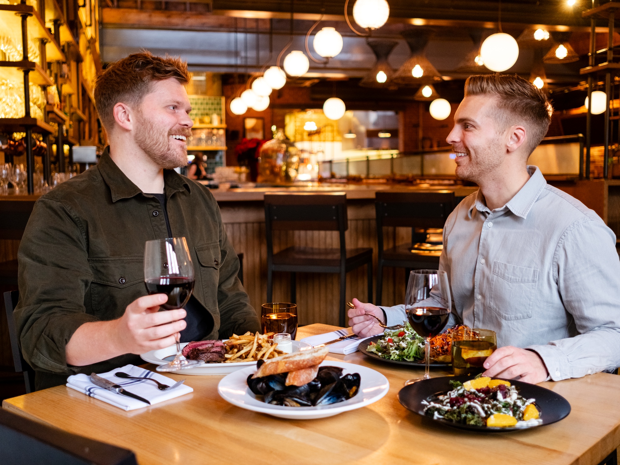 Two people eating at Agricola street brasserie