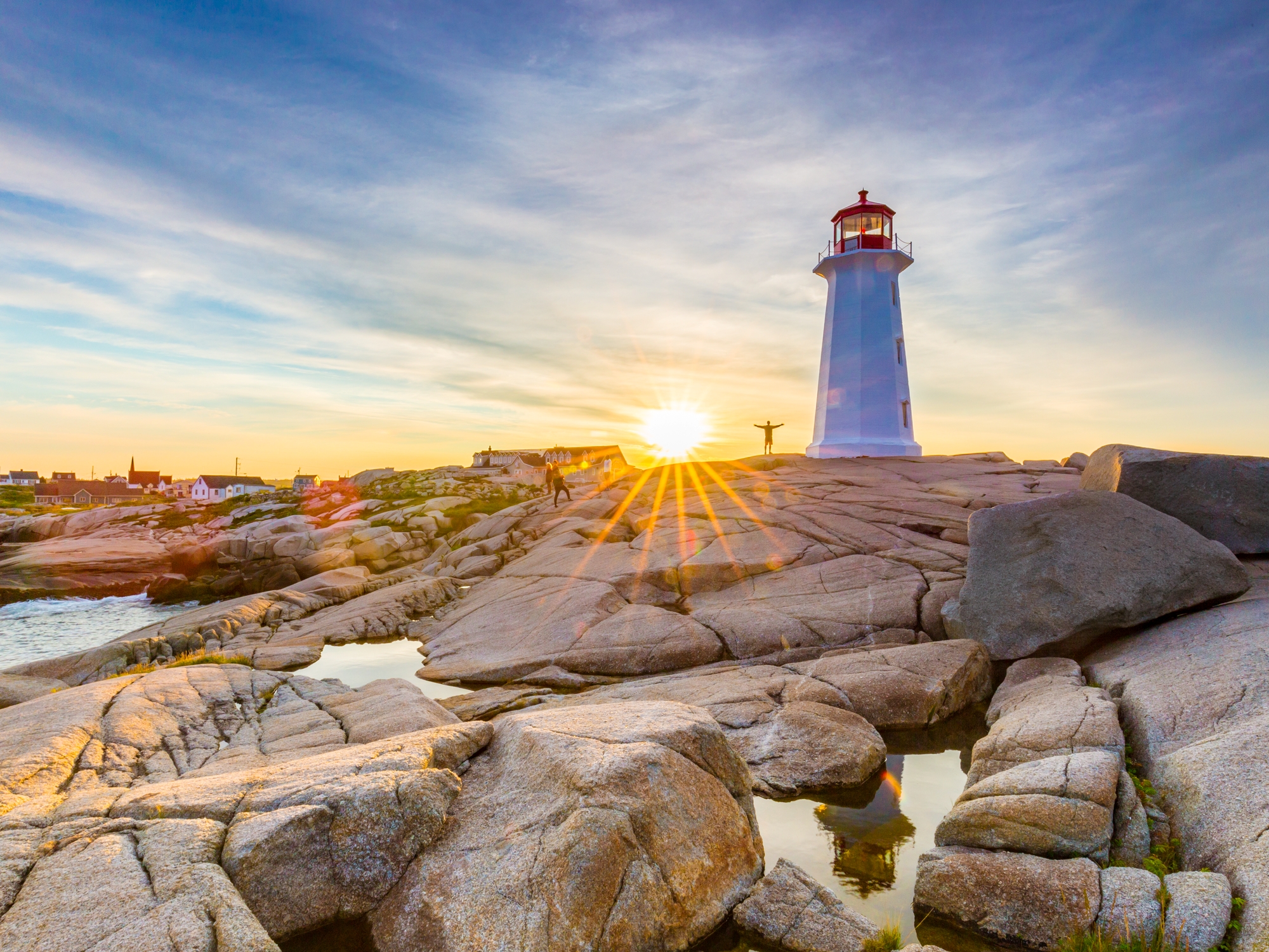 Peggy's Cove lighthouse at sunset