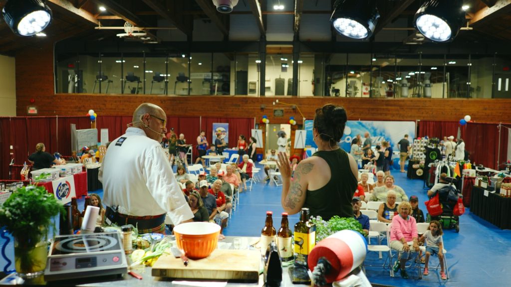 People inside the banquet hall at Expo Culturelle (Culture Expo) in Clare, Nova Scotia