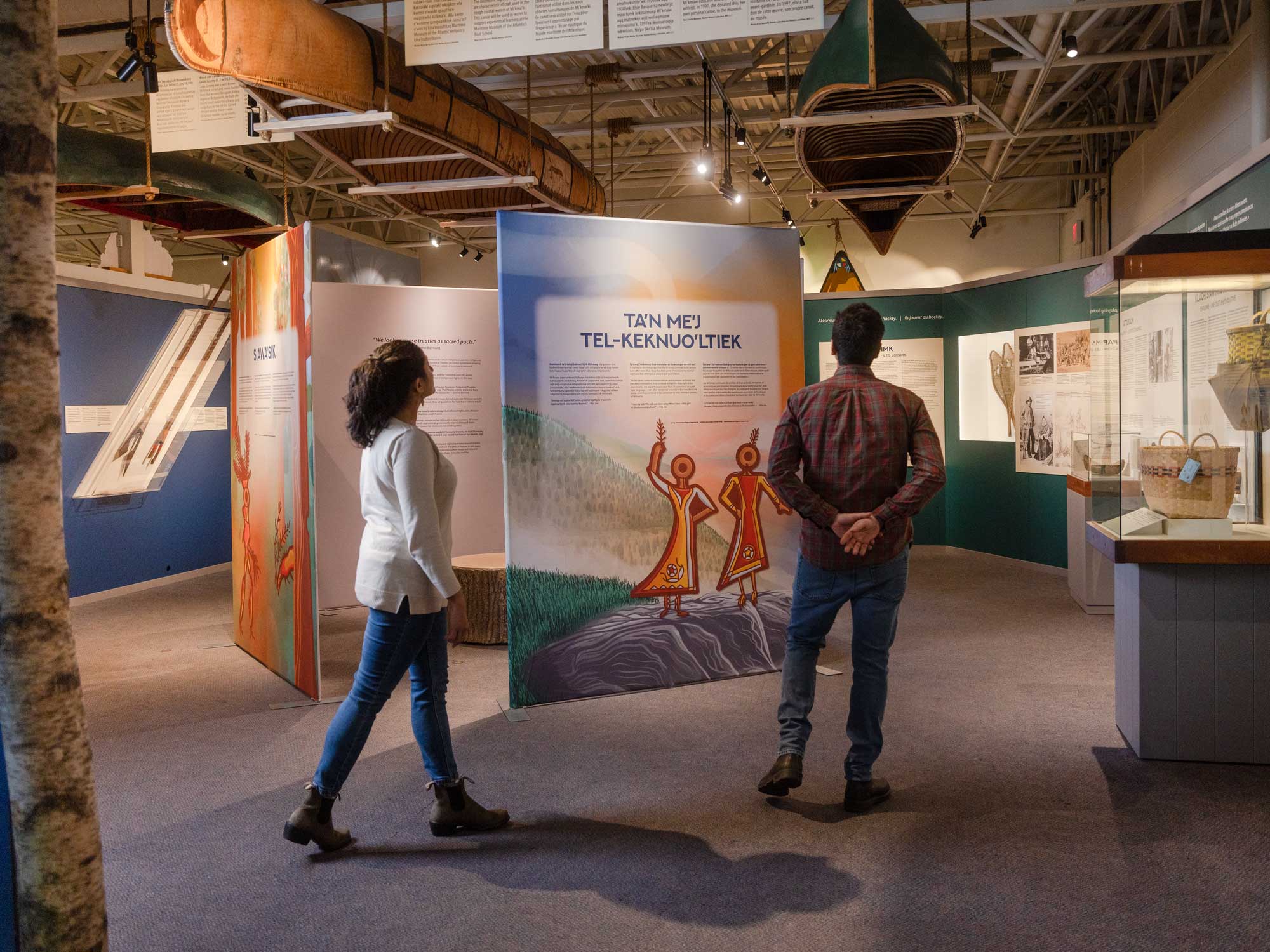 Two visitors explore the exhibit on the Mi'kmaq people that is on display at the Maritime Museum of the Atlantic in downtown Halifax, Nova Scotia.
