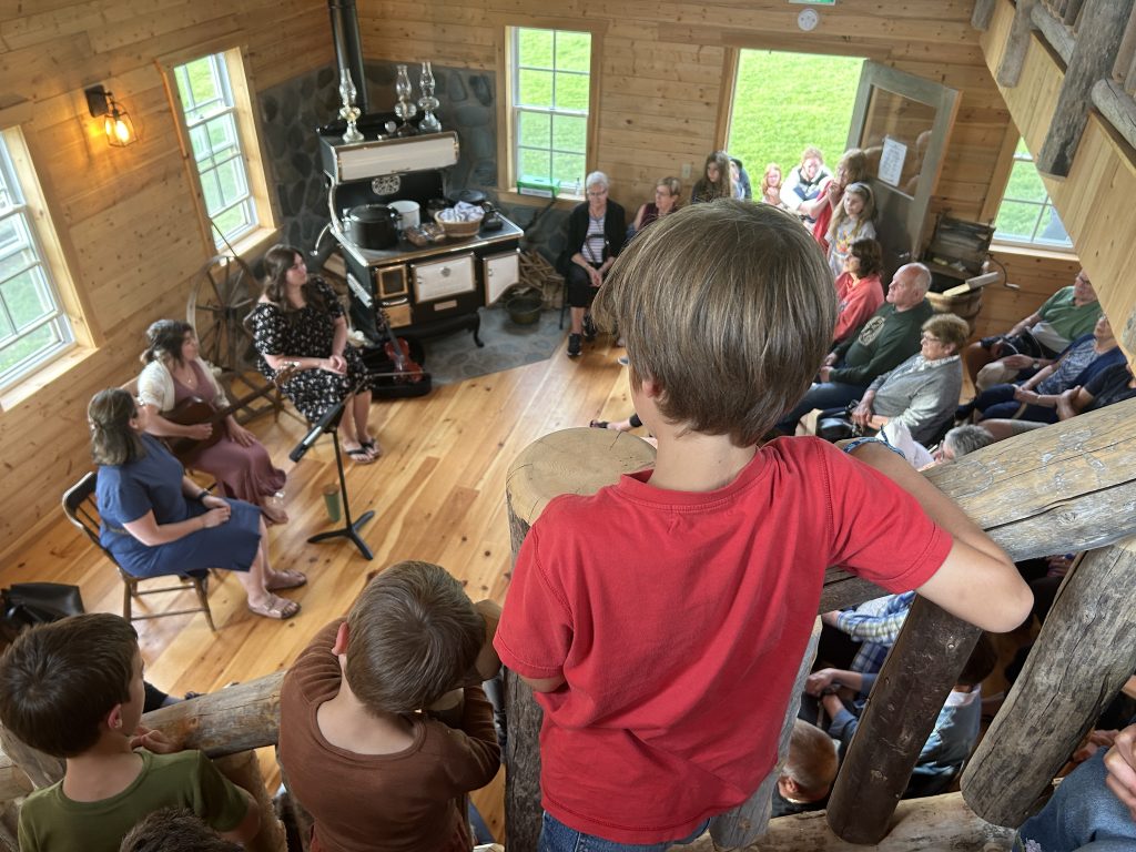 An interior view of the crowd at the Monday Night in the Park at the Interpretation House at Mkwesaqtuk/Cap Rouge Campground in Nova Scotia