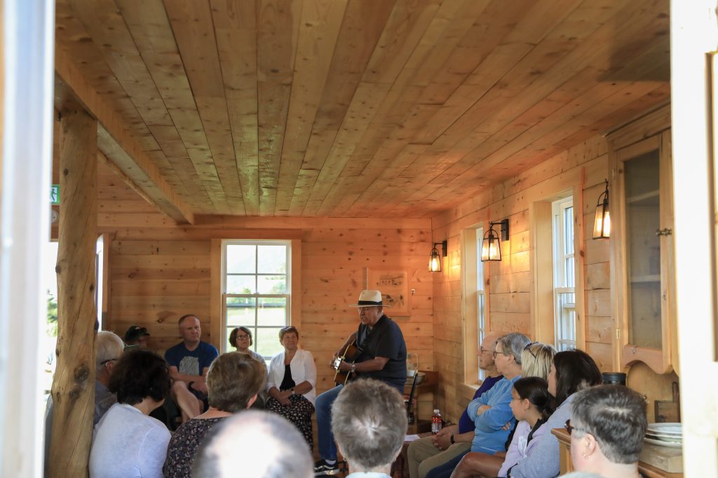 An interior view of the crowd at the Monday Night in the Park at the Interpretation House at Mkwesaqtuk/Cap Rouge Campground in Nova Scotia