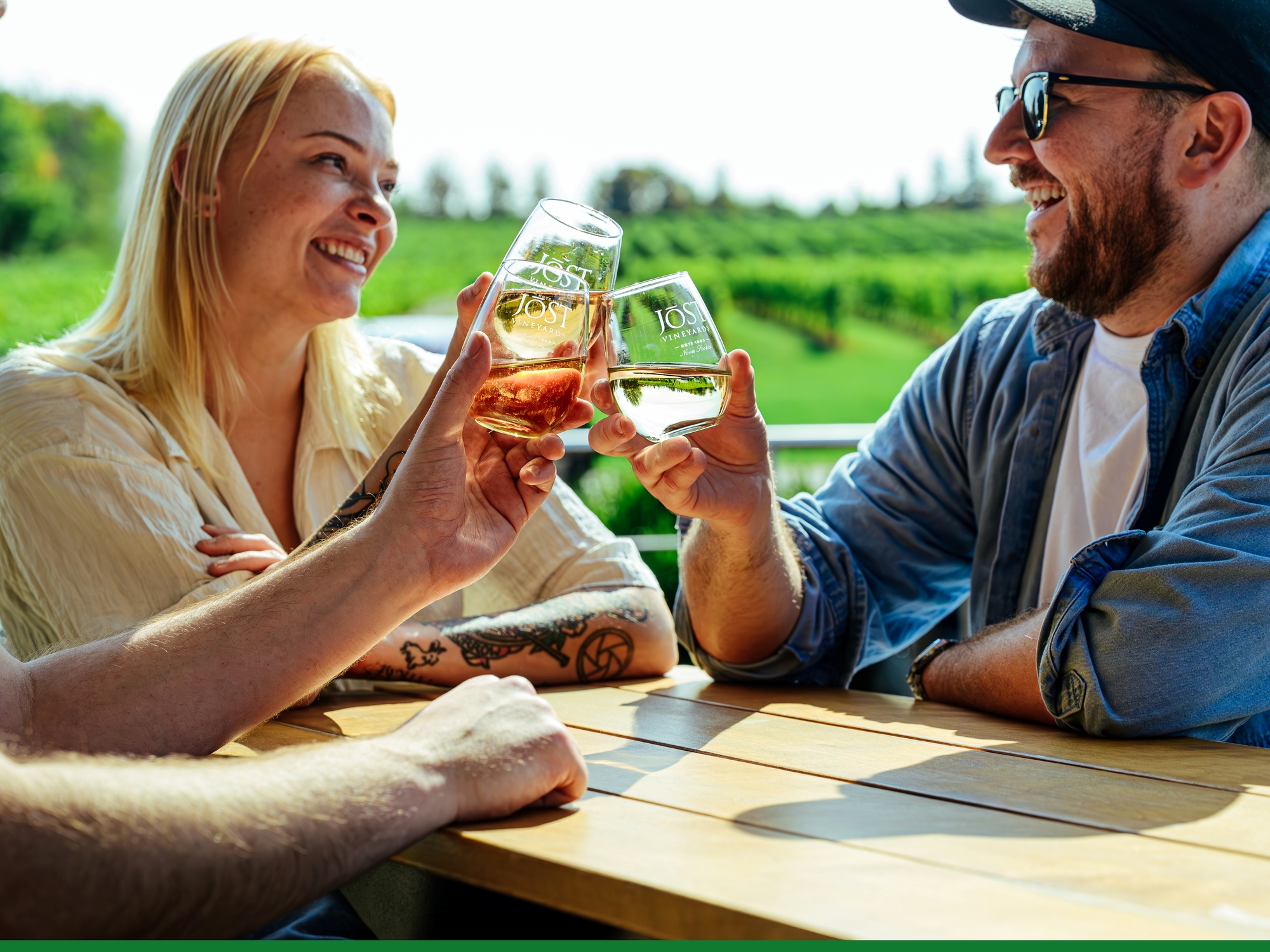 People drinking wine on a patio