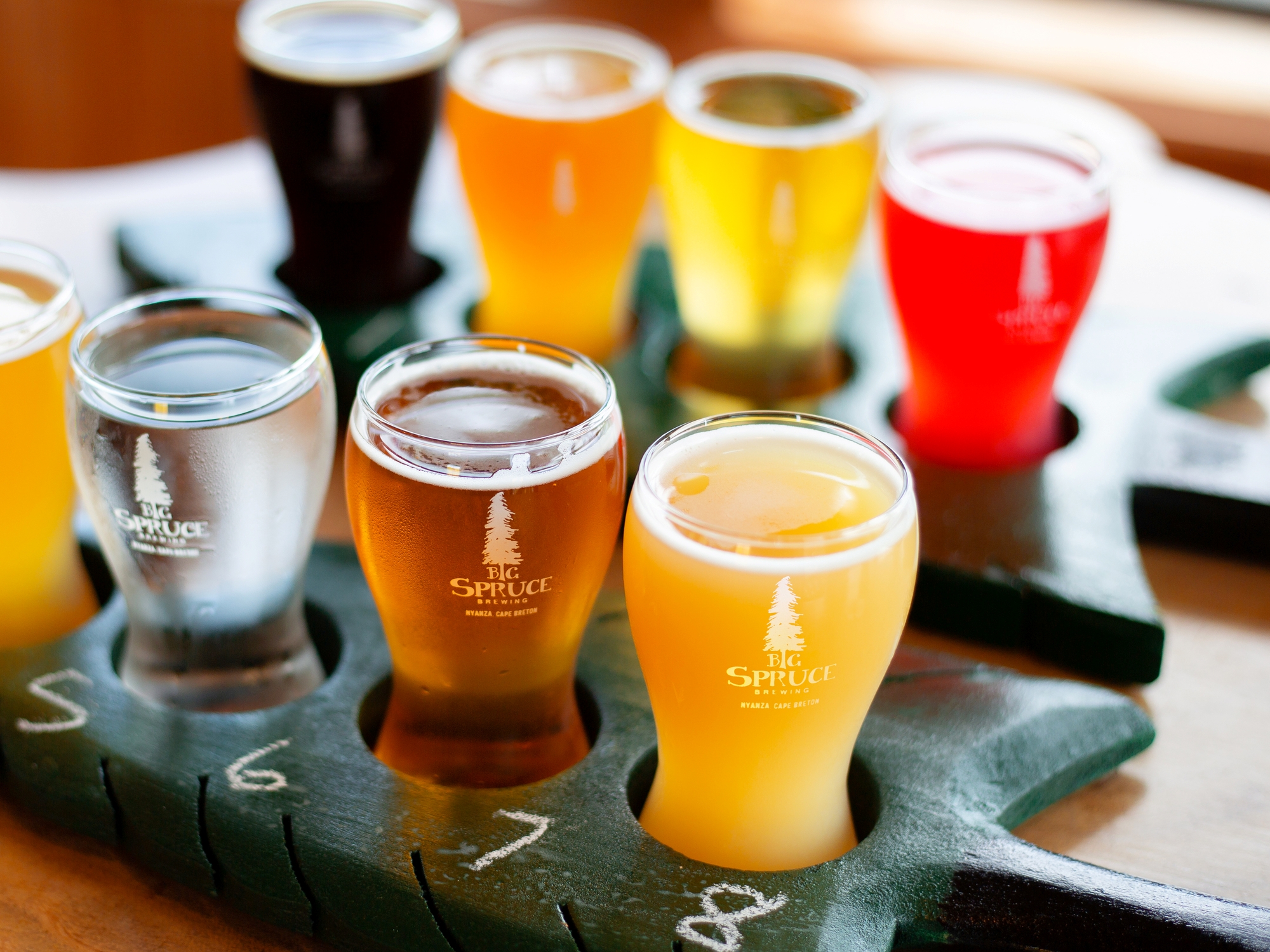 Flight of beer on a wooden table