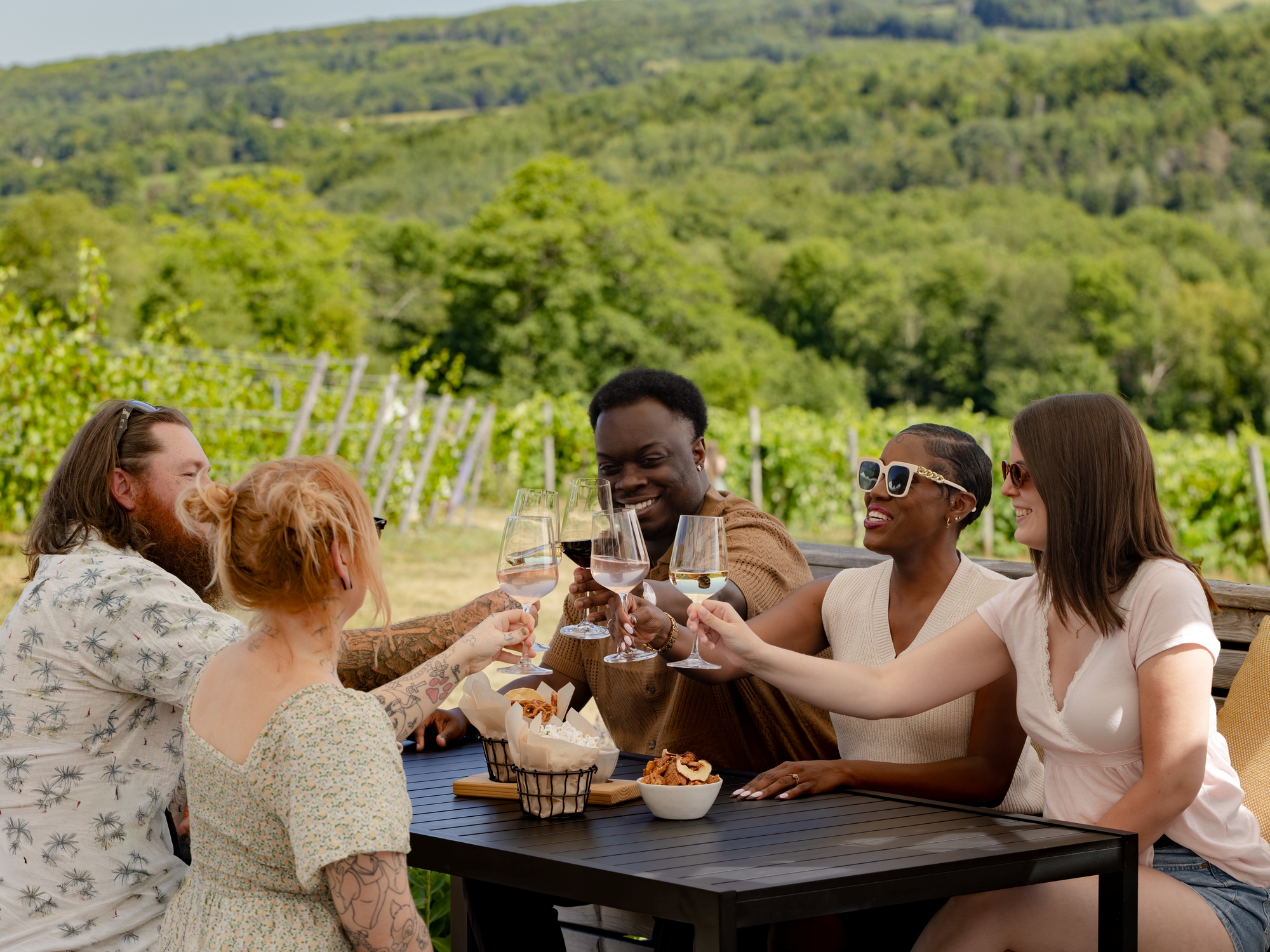 Group of people enjoying wine on a patio