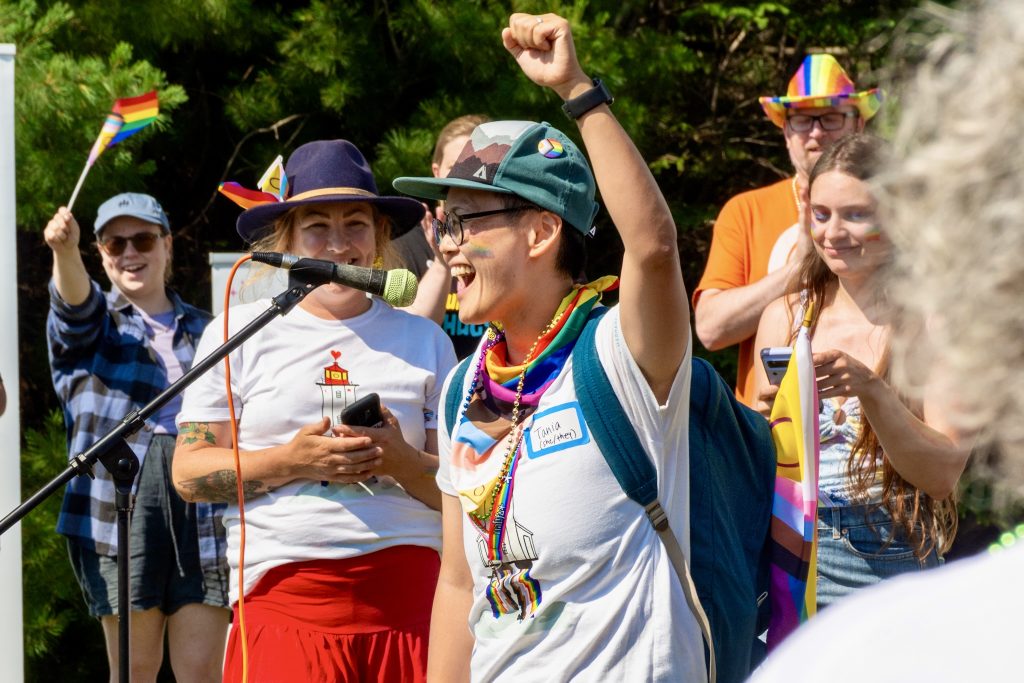 A group of people walking in the Bay Pride Festival in Nova Scotia