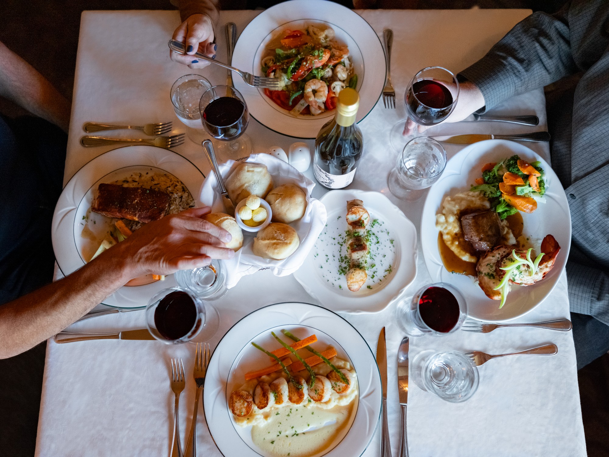 An overhead view of a table of scallop dishes at Digby Pines, in Digby Nova Scotia