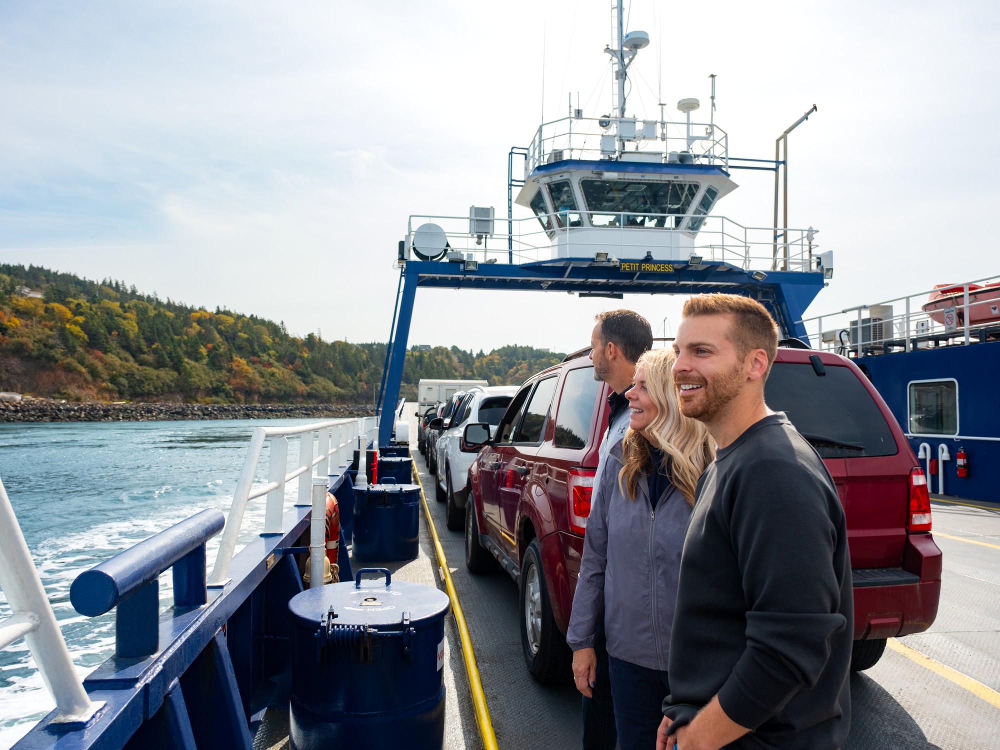 People ride a car ferry from Digby Neck to Long Island in Nova Scotia