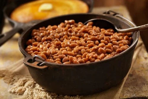baked beans in a black pot