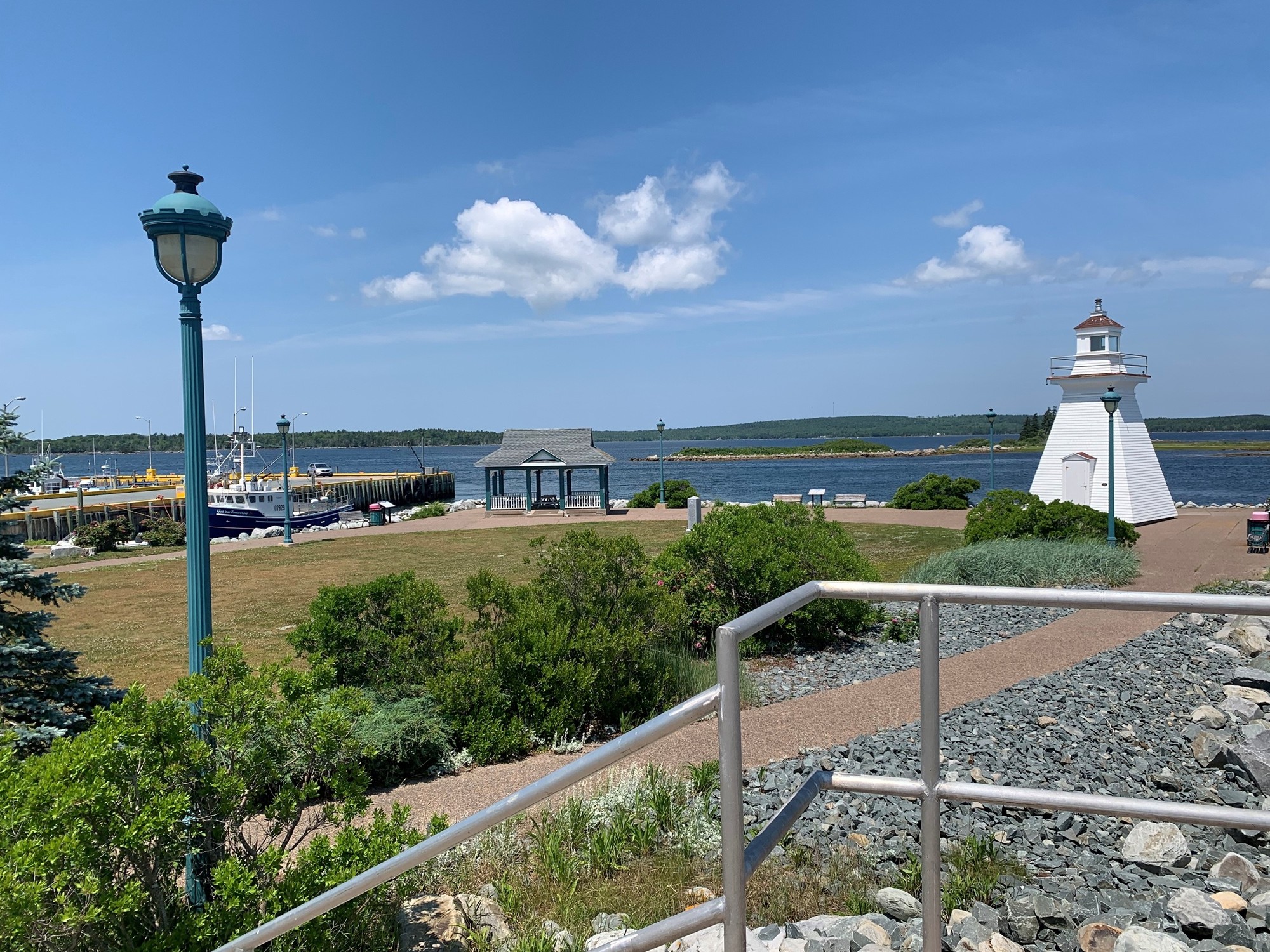 Lighthouse and waterfront at Port Medway Lighthouse Park in Port Medway, Nova Scotia