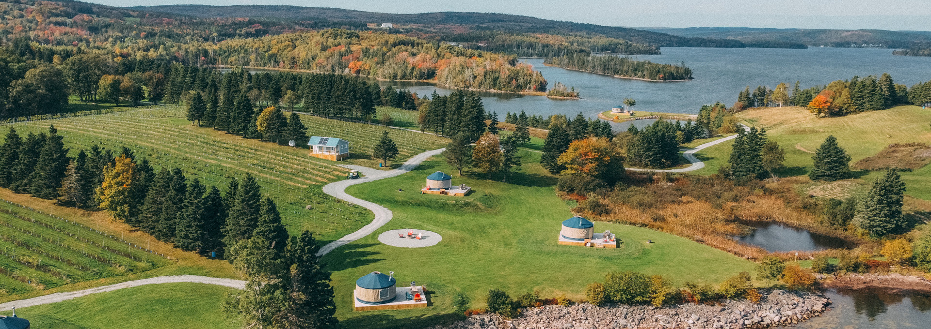 Aerial view of Authentic Seacoast Yurts during fall in Nova Scotia