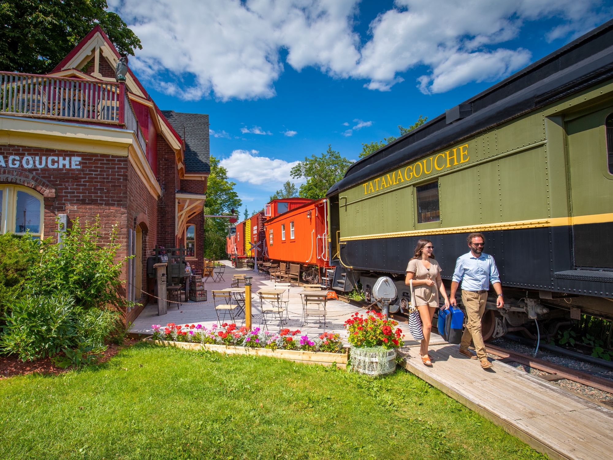 Couple walking at Train Station Inn in Tatamagouche