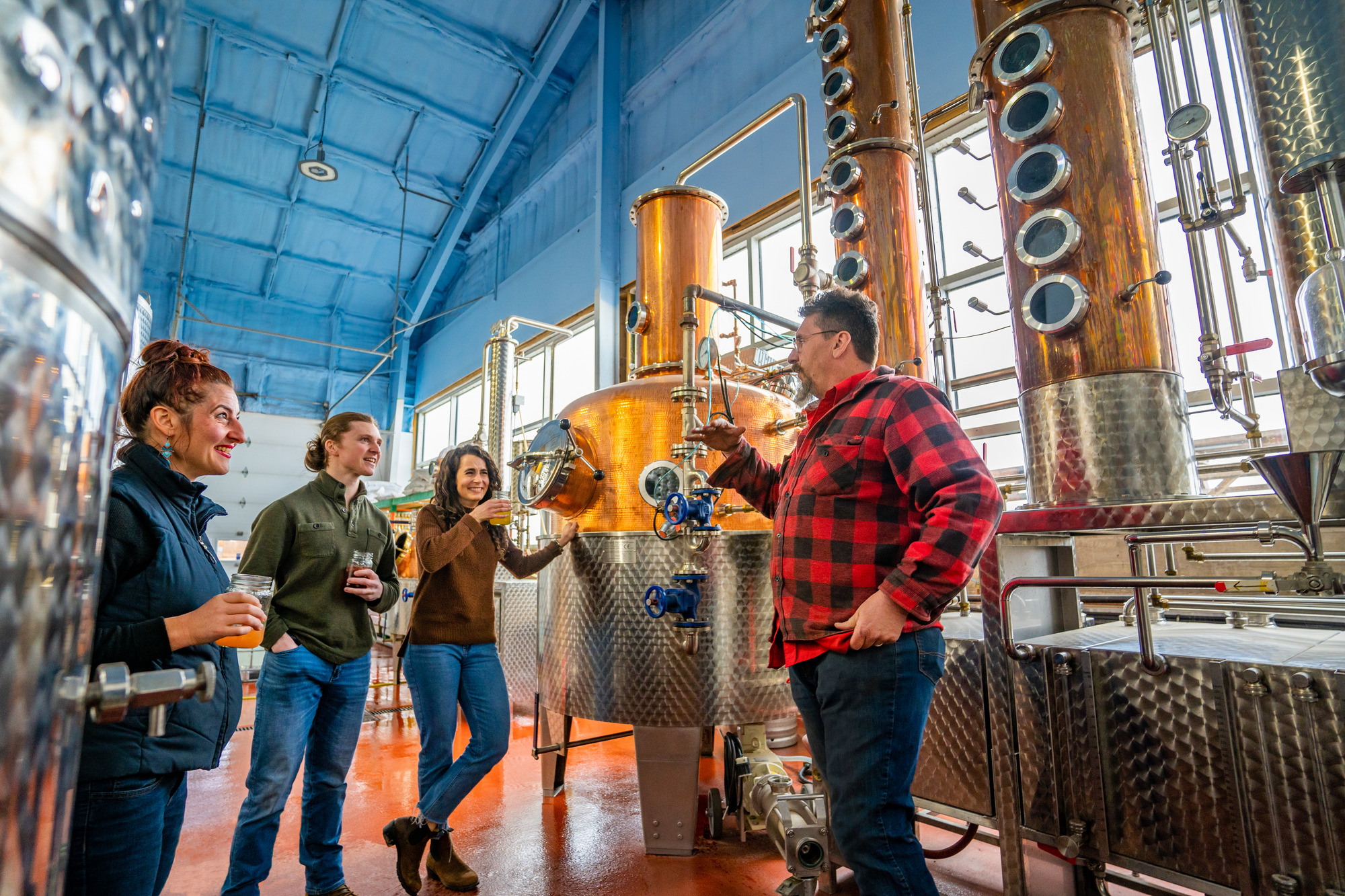 Individuals on a distillery tour at Steinhart Distillery in Antigonish, Nova Scotia.