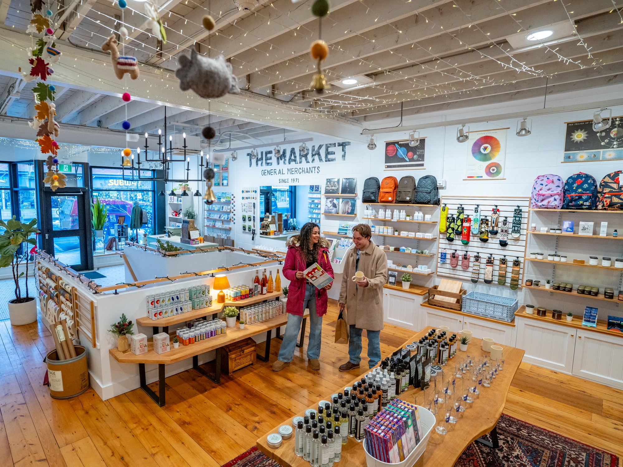Two people shop for good at The Market in Wolfville, Nova Scotia