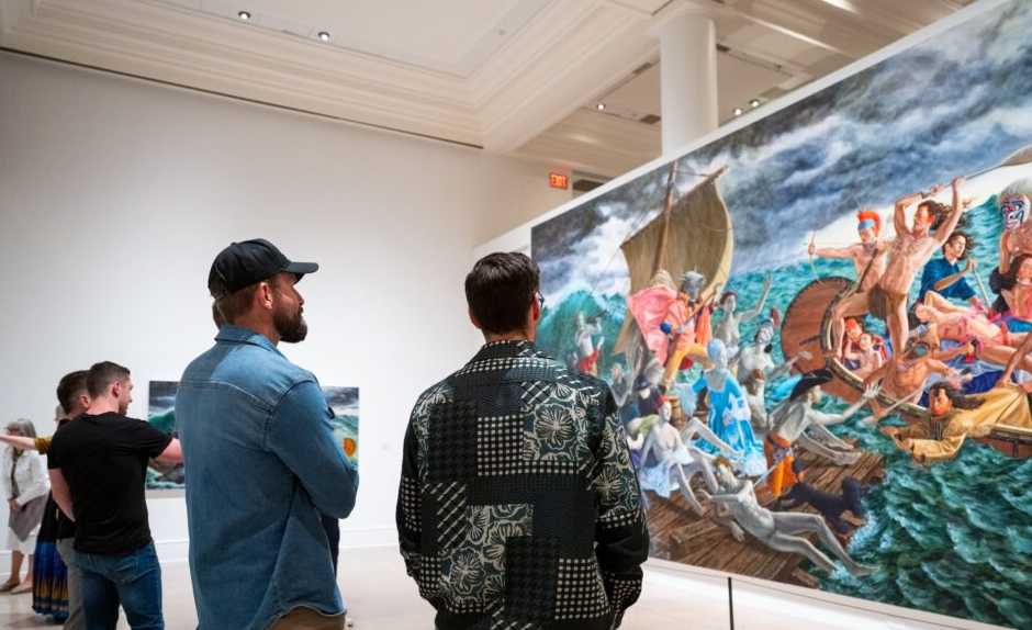 A group of people enjoy the exhibit at the Art Gallery of Nova Scotia in Halifax